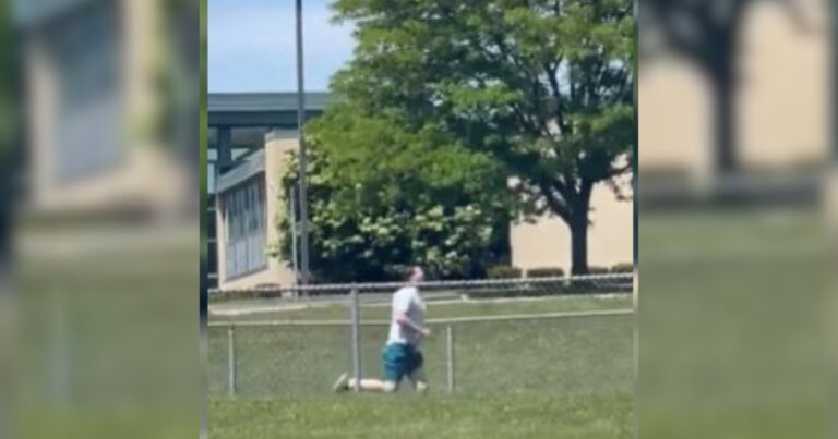 Man Hops Fence to Save Frightened Baby Deer from Being
Alone